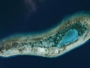 卫星图曝越南在占华日积礁挖新航道 岛礁被挖出一个新的通道