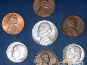 为什么硬币上的头像是侧面，而纸币却是正面
