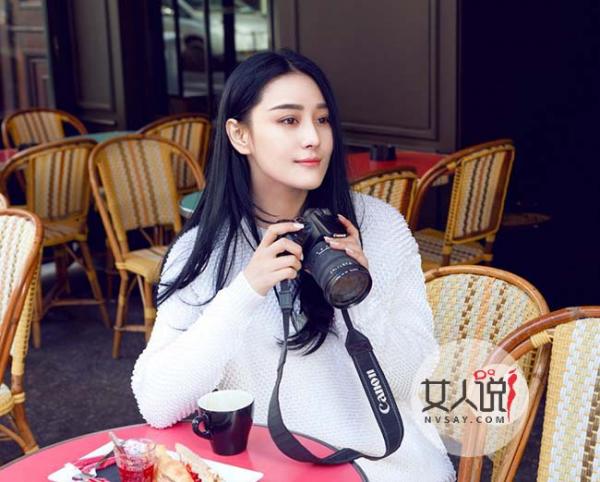 张馨予爆炸头亮相时装周 大长腿格外抢镜少女俏皮感十足