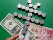 11月份人民币汇率创新低 海外投资需减持